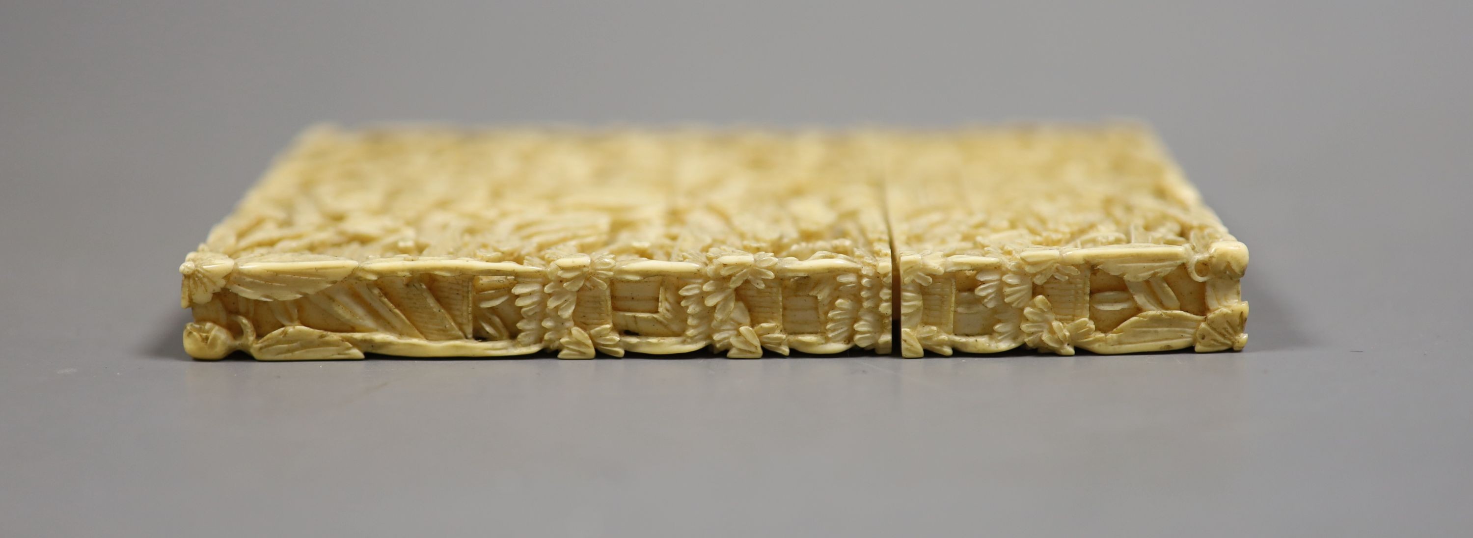 A Chinese Cantonese carved ivory card case, 11.5cm